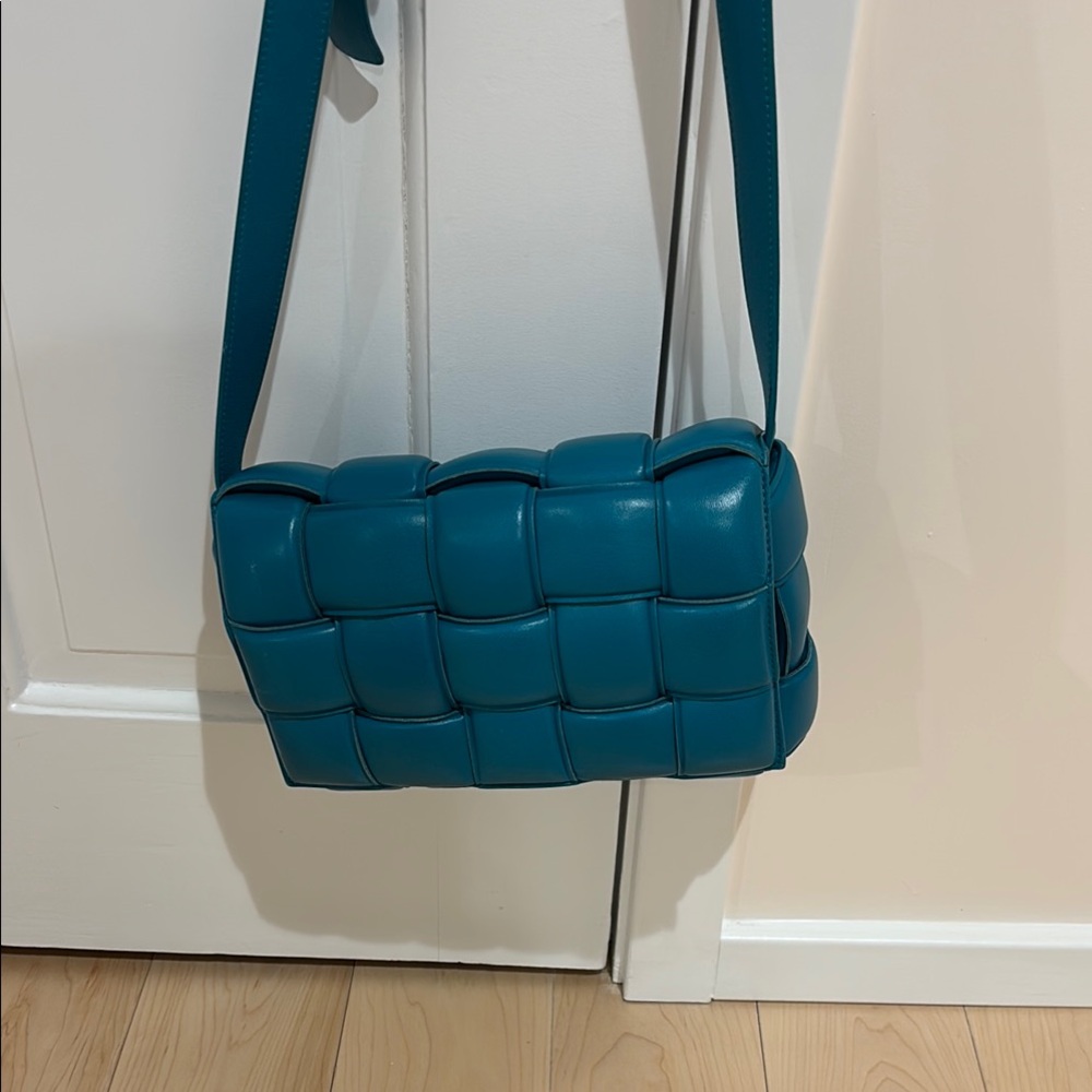 Bottega venetta padded cassette bag in teal/turquoise color